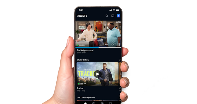 A hand holding a mobile with a personalized content on screen.
